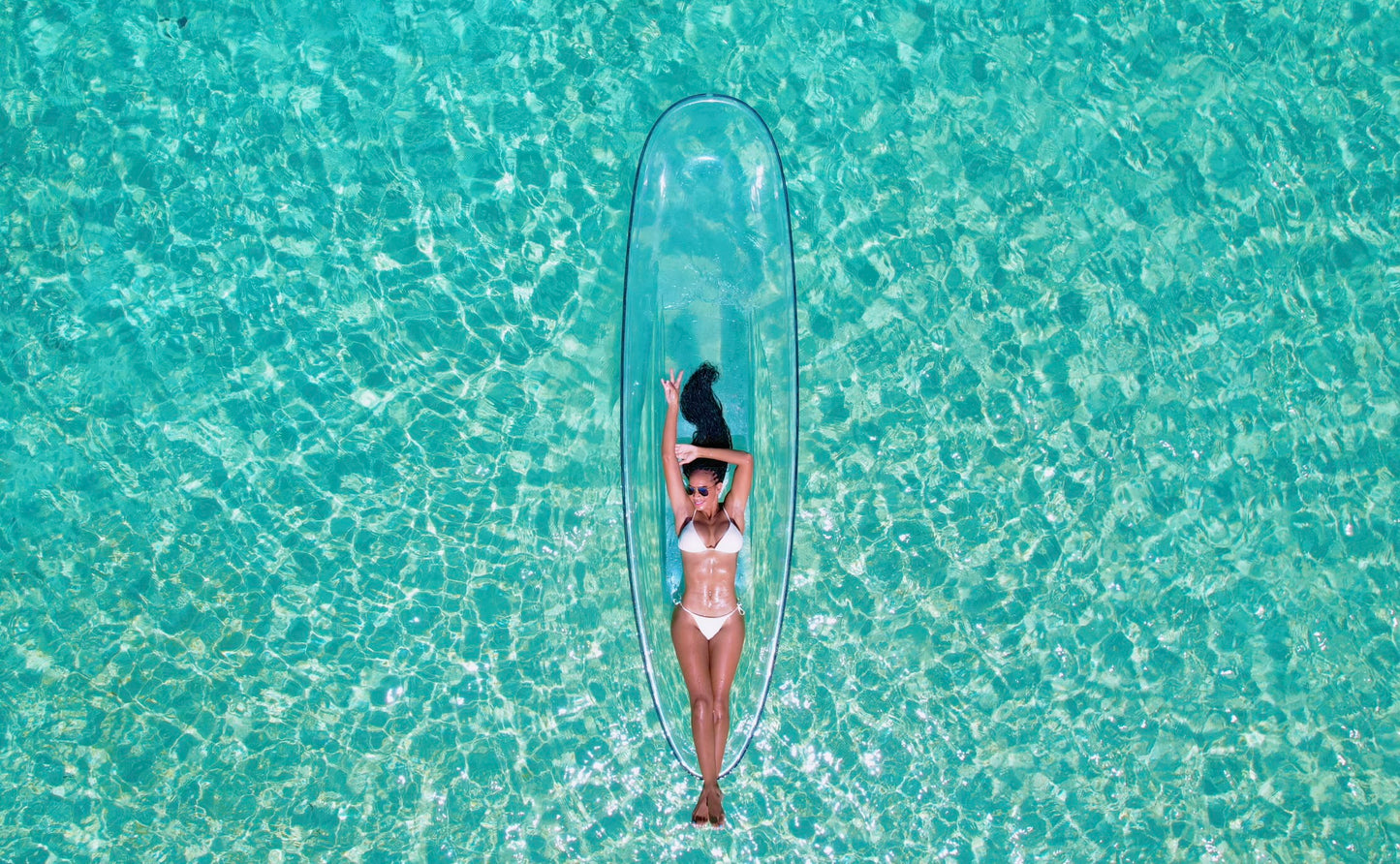 2- in-1 Luxury Clear Kayak + Bamboo Rafting With Limestone Foot Massage bundle. (Transportation MUST be booked if there’s only 1 guest as this is a multi-location excursion).. Free Transportation provided ONLY for groups of two or more.)